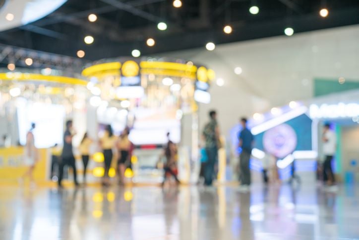 abstract blurred busy airport hall with people for background